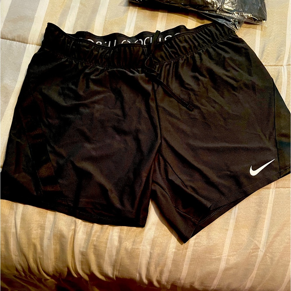 Nike workout or running shorts band new very light weight